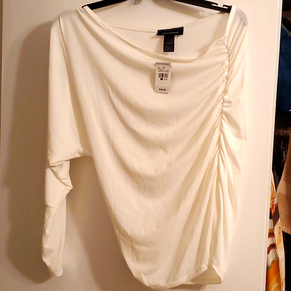 New w/Tag - Creme off the left shoulder top with a zipper midsleeve on rt side